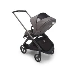 Bugaboo Dragonfly 3-in-1 Bundel Graphite-Grey Melange 19 Bugaboo Dragonfly 3-in-1 Bundel Graphite-Grey Melange -Joolz Verkoop bugaboo dragonfly graphite grey melange grey melange top shot